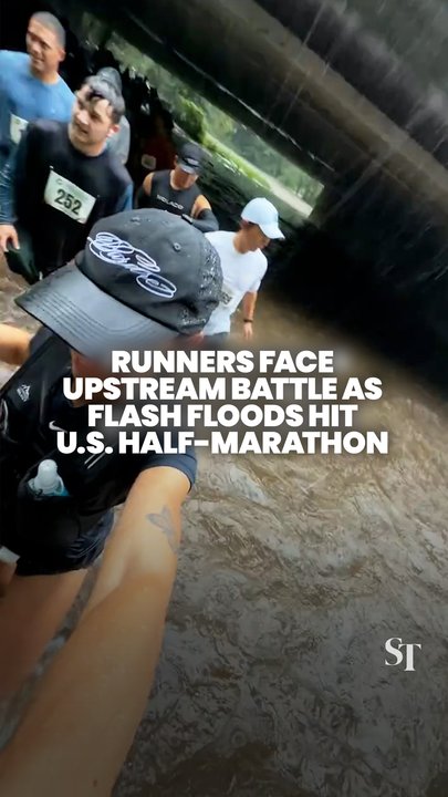 Runners brave waist-deep floodwaters during half-marathon in New Jersey