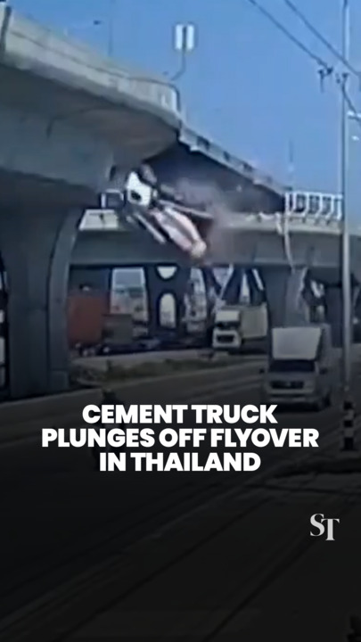 Cement truck falls off U-turn bridge and onto car below in Thailand