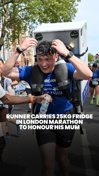 Runner carries 25kg fridge in London Marathon to honour mum who died of dementia