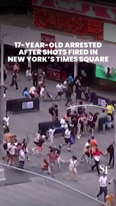 People scramble for cover after shots fired in New York’s Times Square