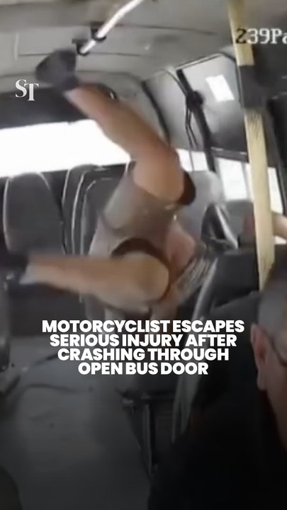 Speeding motorcyclist in Colombia crashes into bus through open door, escapes death