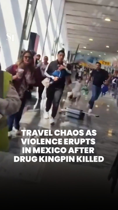 Frightened tourists flee as violence erupts in Mexico after drug kingpin killed