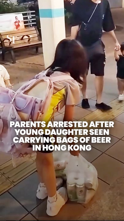 Parents arrested after making young daughter carry heavy bags of beer