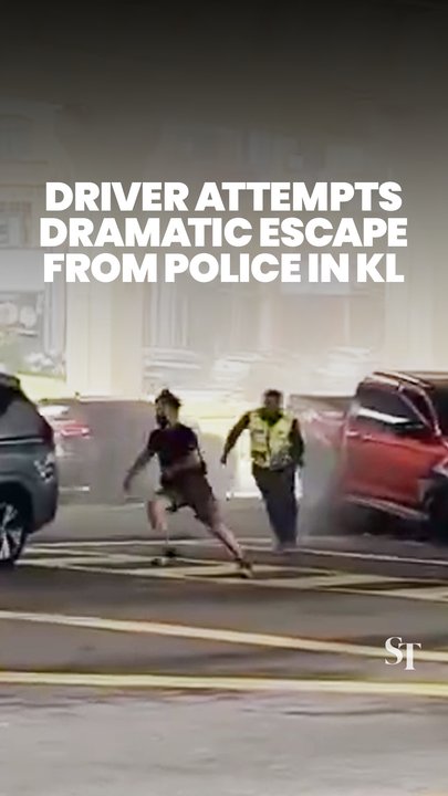 Man attempts to flee from police after truck crashes into road barrier in KL