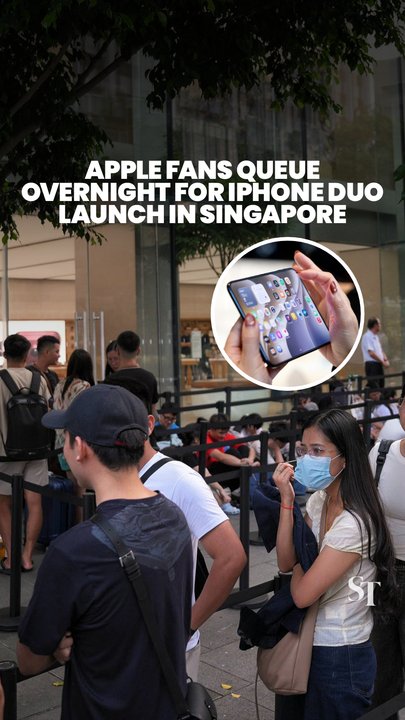 Fans queue overnight for launch of iPhone Duo at Apple’s Orchard Road flagship store in Singapore