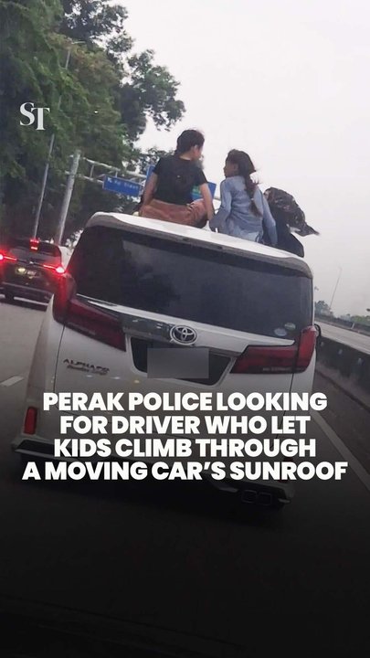 Police looking for driver who let kids climb through moving car’s sunroof in Ipoh, Malaysia