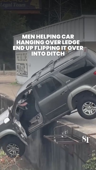 Car falls off ledge and flips over in Hattiesburg, Mississippi despite help from passers-by
