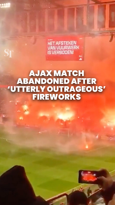 Ajax match against Groningen abandoned after ‘utterly outrageous’ fireworks