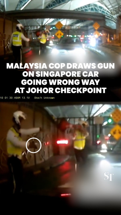 Malaysia cop draws gun on Singapore car going wrong way at Johor checkpoint