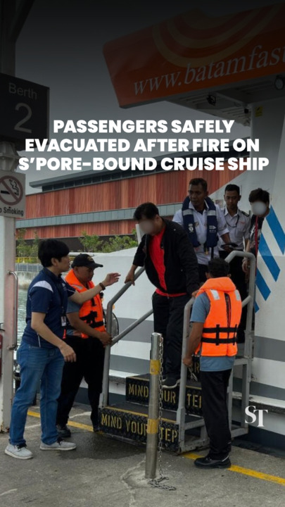 Passengers evacuate after fire on cruise ship en route to Singapore