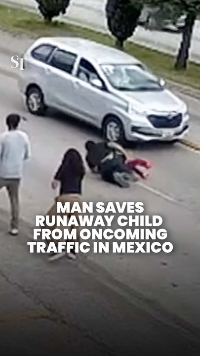 Supermarket worker dives to save child from oncoming traffic in Mexico