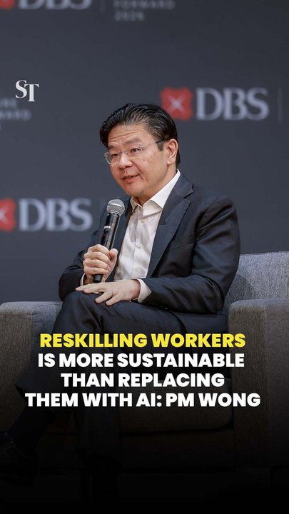 Reskilling workers is more sustainable  than replacing them with AI: PM Wong