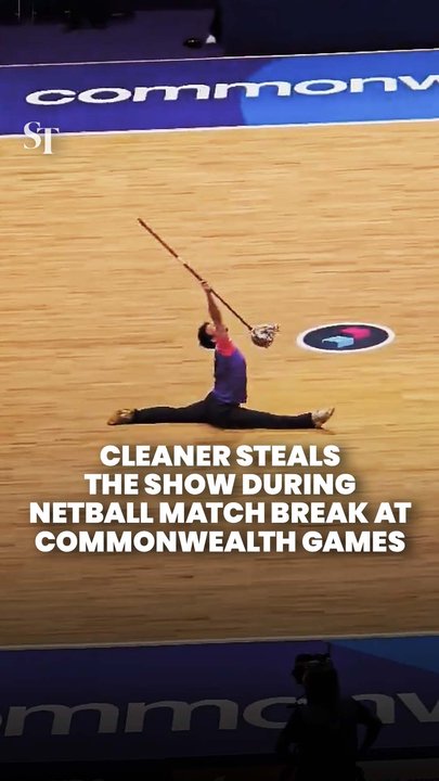 Volunteer cleaner mops up the spotlight during Commonwealth Games netball match break