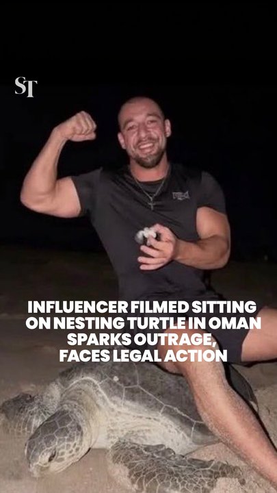 Couple visiting Oman sparks outrage after sitting on turtle as it lays eggs