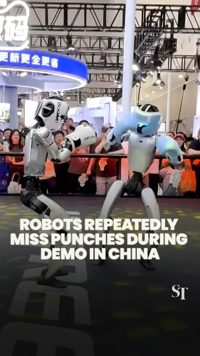 Humanoid robots repeatedly miss their punches during sparring demo in Zhejiang, China