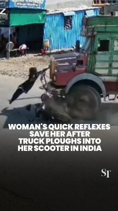 Woman miraculously survives collision with sand dumper by hanging onto it after crash