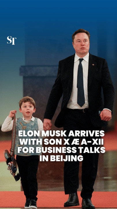 Elon Musk arrives with son X Æ A-Xii for business talks in Beijing