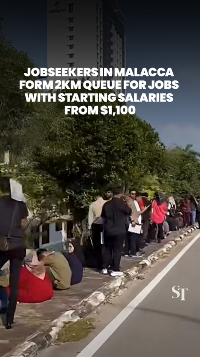 Jobseekers form 2km queue for semiconductor jobs with starting salaries from $1,100 in Malacca