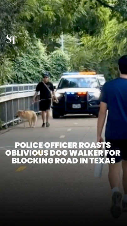 Police officer roasts oblivious dog walker for blocking road in Texas