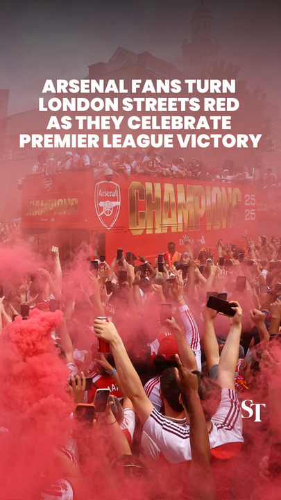 Arsenal fans turn London streets red for Premier League victory parade