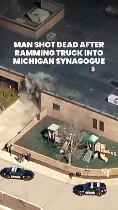 Man shot dead after ramming vehicle into Michigan synagogue