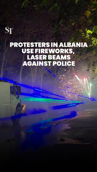 Protesters in Albania use fireworks and laser beams against police