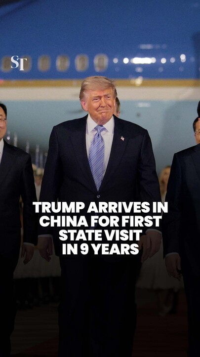 Flags and fanfare for Trump’s arrival in China
