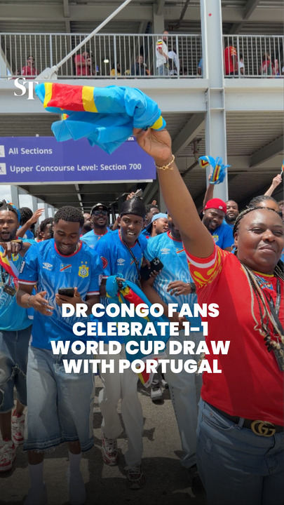DR Congo fans celebrate 1-1 draw with Portugal in their return to World Cup after 52 years