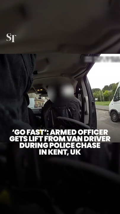 UK policeman gets a lift from a van driver during a police chase