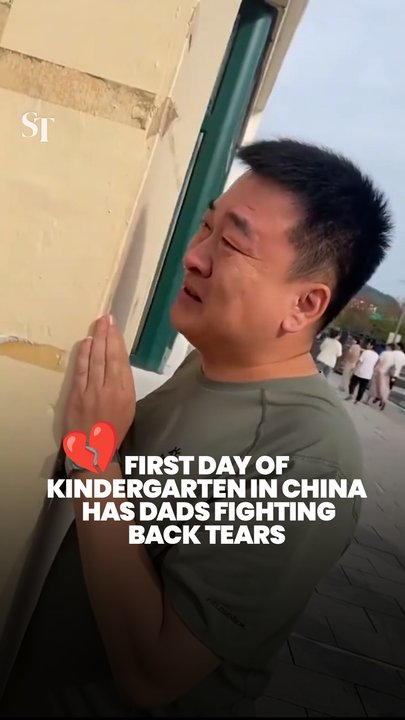 Dads in China get emotional watching their kids start their first day of kindergarten
