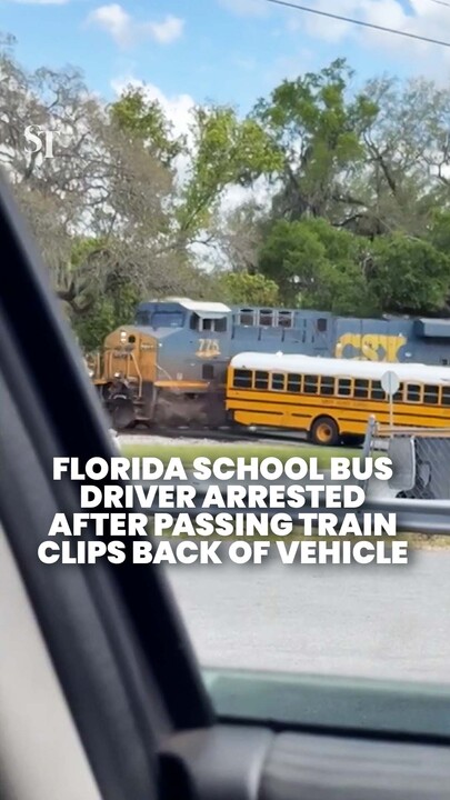 School bus driver in Florida arrested after close shave with train at crossing