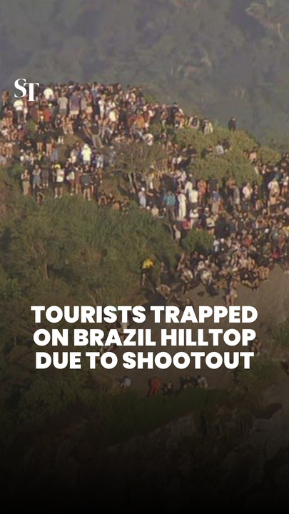 Tourists trapped on Rio de Janeiro hilltop during police shootout with gangsters