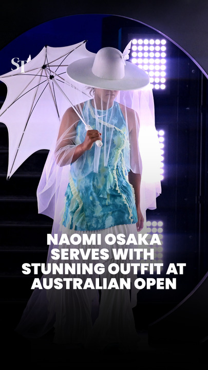 Naomi Osaka serves with stunning outfit at Australian Open