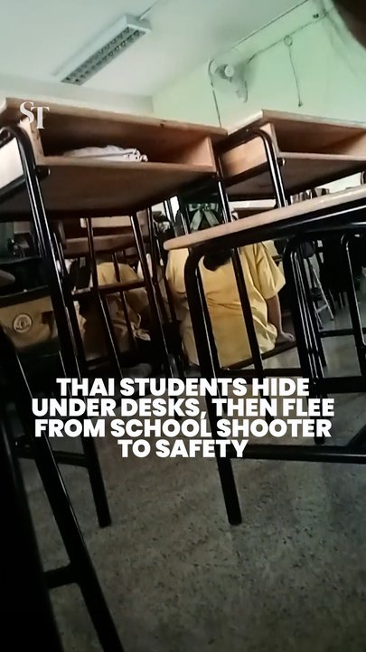Thai students hide under desks before fleeing from school shooter