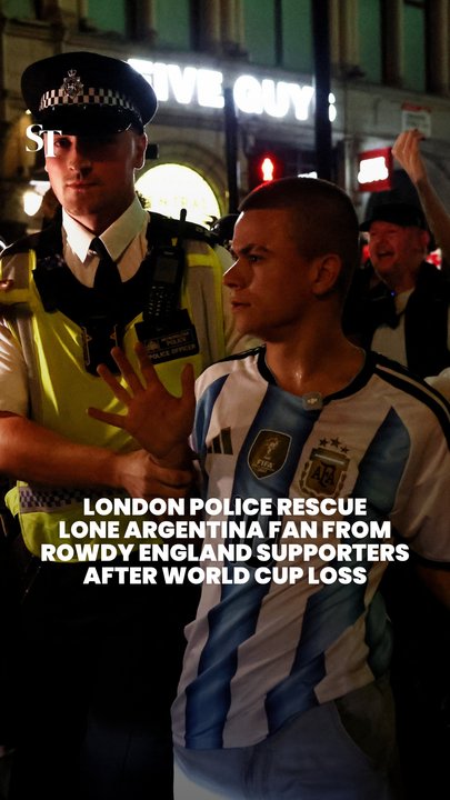 Solo Argentina fan escorted by London police after being chased by rowdy England fans