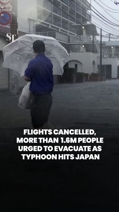 Typhoon Dujuan hits Japan, bringing floods and heavy rain