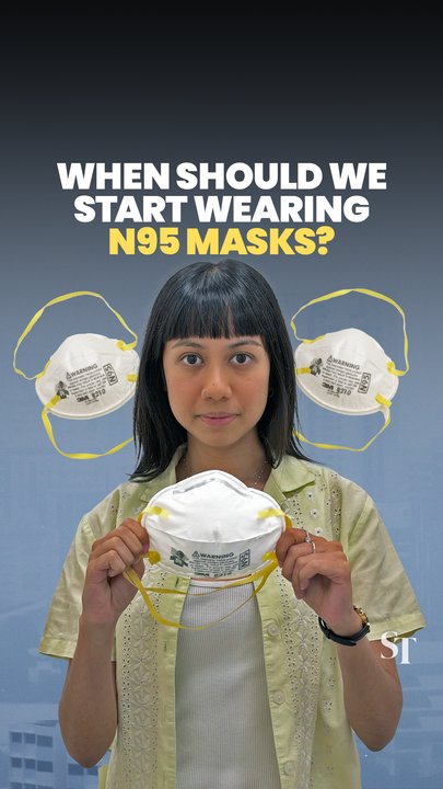 When should Singaporeans start wearing N95 masks because of the haze?