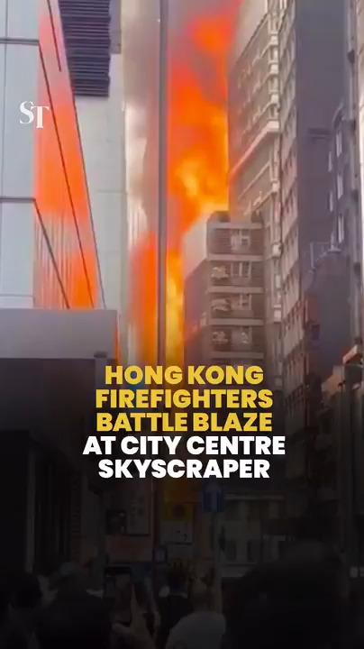Hong Kong firefighters battle blaze at city centre skyscraper