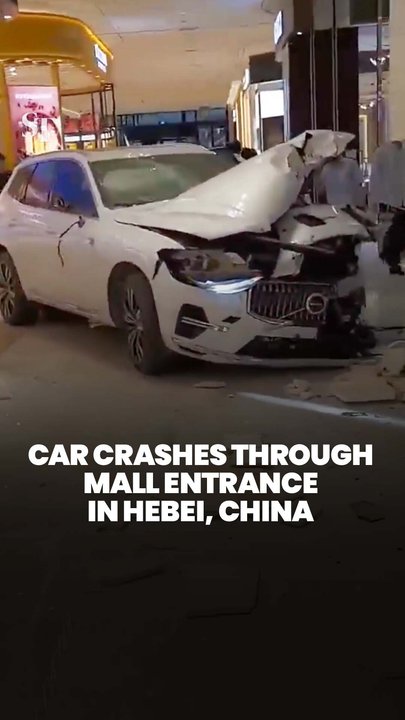 Car crashes into entrance of shopping mall in Hebei, China