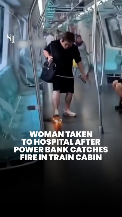 Woman taken to hospital after power bank catches fire in train at Admiralty MRT station