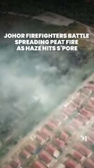 Firefighters battle Johor peat fire as haze hits Singapore