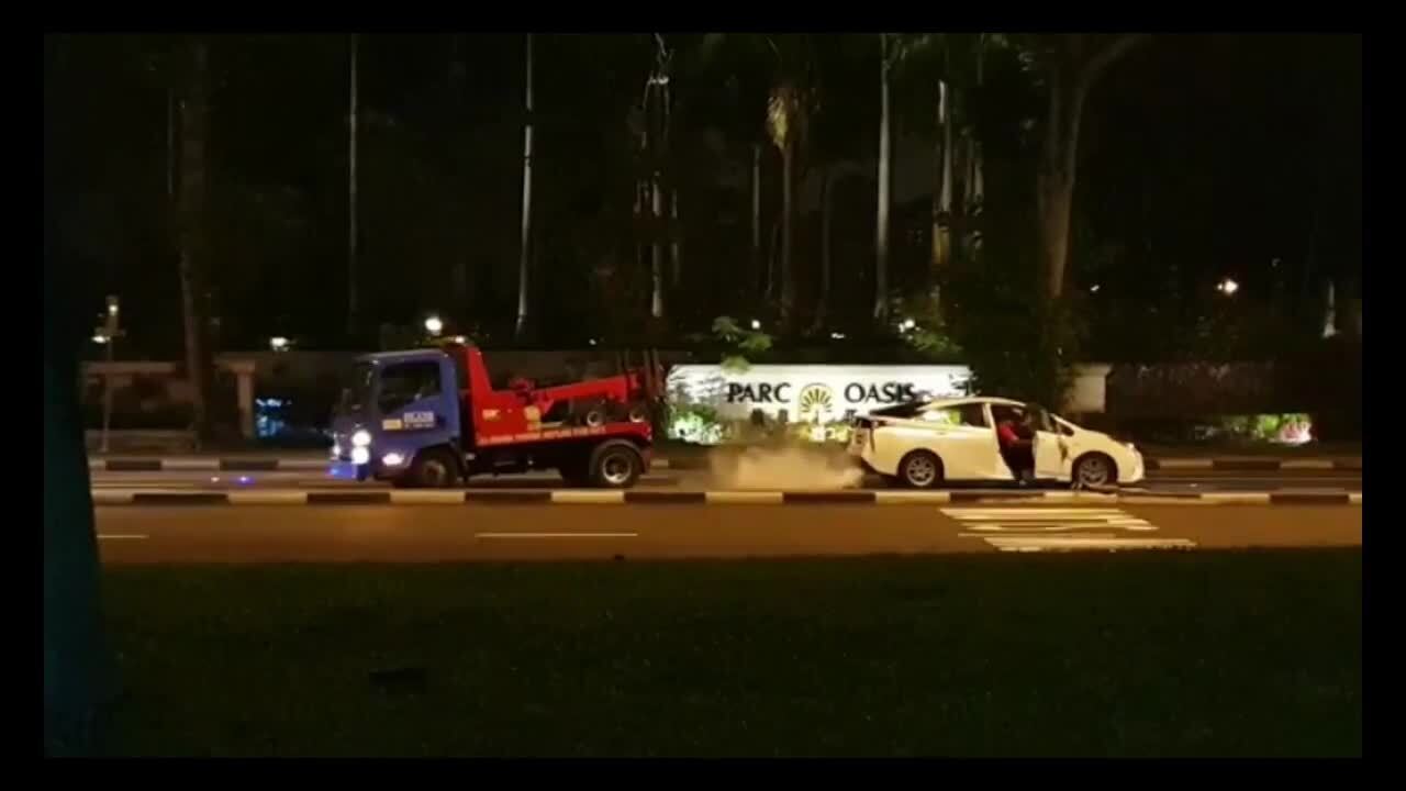 Car turns turtle along Jurong East Avenue 1