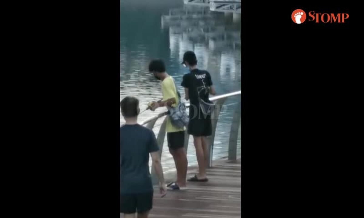 YOUNG PUNKS ILLEGALLY FISHING IN WATERS IN FRONT OF LOUIS VUITTON @MBS